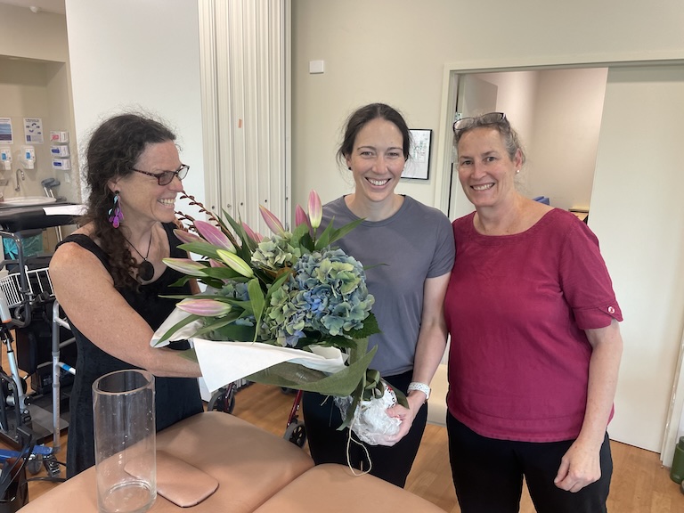 Melissa receiving flowers with Janet Stevens and Kim Jennings at her successful Qualification event.